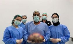 Şişlik yüzünden gittiği hastanede karnından 10 kilogram ağırlığında kitle çıkarıldı