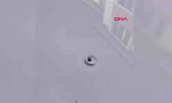 Yorgun mermi otomobilin tavanını deldi