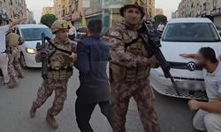Alparslan Kuytul ve Eşinin Gözaltı Sürecinde Polis Aracının Önüne Yatılması Olayı