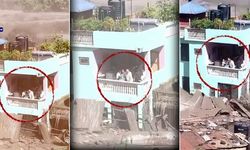 Nepal'de sel felaketinde mahsur kalan aile balkonunda yardım bekliyor