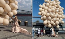 İstanbul'da fotoğraf çekimi sırasında büyük helyum balonları kadını sürükledi