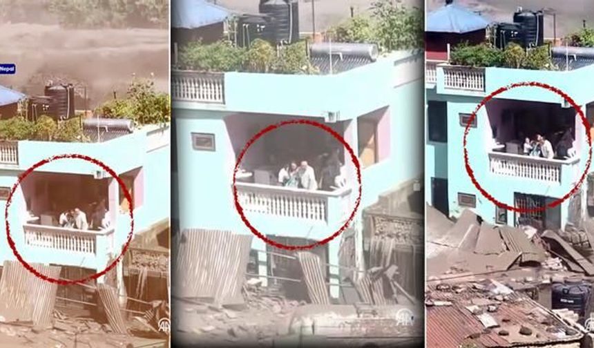 Nepal'de sel felaketinde mahsur kalan aile balkonunda yardım bekliyor